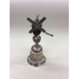 An unusual silver cup in the form of a windmill at