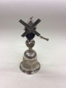 An unusual silver cup in the form of a windmill at