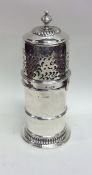 A massive silver lighthouse sugar caster with pier