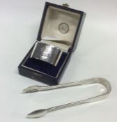 A cased silver commemorative napkin ring together