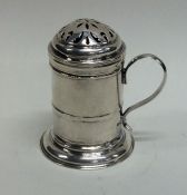 An unusual Georgian silver muffiniere of typical f