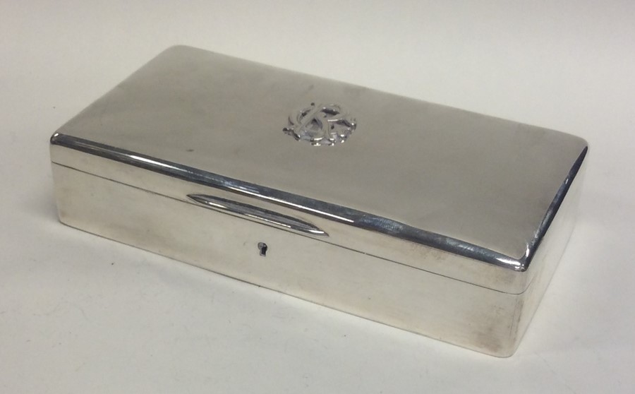 A good quality Edwardian hinged top silver cigaret