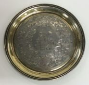 A good Russian silver gilt waiter engraved with fl