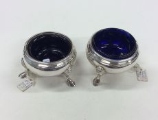 A matched pair of Georgian style silver salts comp