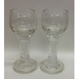 A pair of Antique air twist stem glasses. Approx.