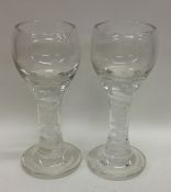 A pair of Antique air twist stem glasses. Approx.