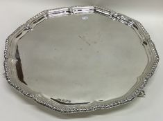 A good quality Edwardian silver salver with gadroo