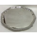 A good quality Edwardian silver salver with gadroo