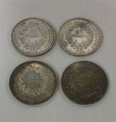 Four heavy silver French 50 Franc pieces. Est. £30