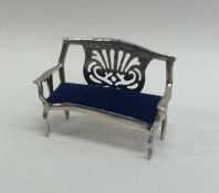 An unusual French silver doll's house sofa. Approx.