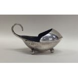 A novelty Edwardian silver salt with pouring lip o