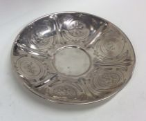 An attractive Victorian silver saucer. Sheffield.