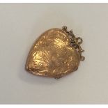 A small heart shaped 9 carat locket. Approx. 3.5 g