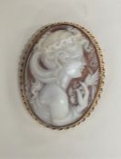 An attractive cameo of a lady in 9 carat frame. Ap