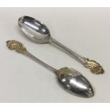 A pair of Scandinavian silver and silver gilt spoo