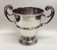 A tall silver two handled trophy cup. Chester. App