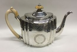 A good quality George III bright cut silver teapot