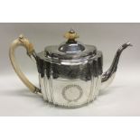 A good quality George III bright cut silver teapot