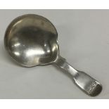 A heavy Georgian silver fiddle pattern caddy spoon