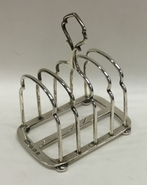 A good silver five bar toast rack / smartphone doc