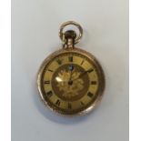 A 9 carat fob watch with gilt dial. Approx. 32 gra