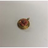A good quality Victorian high carat gold pendant w