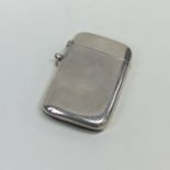 A massive silver plain vesta case with hinged top.