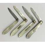 Four large silver and MOP fruit knives with reeded