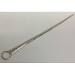 A long Georgian silver meat skewer with ring thumb