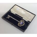 A massive silver and enamel key in fitted box. Bir