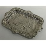 A small silver letter tray depicting Sir Walter Ra
