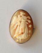 A 9 carat shell cameo of winged infants with safet