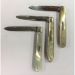Three silver and MOP fruit knives with plain blade