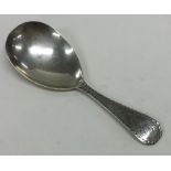 A Georgian silver bright cut caddy spoon decorated