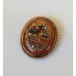 A good quality enamel and agate target brooch with