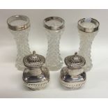 A garniture of three glass vases together with a p
