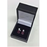 A pair of attractive ruby and diamond earrings in