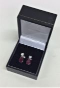 A pair of attractive ruby and diamond earrings in
