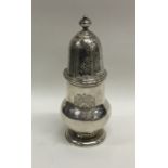 An early 18th Century silver sugar caster attracti