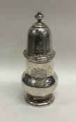 An early 18th Century silver sugar caster attracti