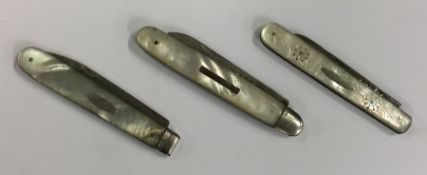 Three silver and MOP fruit knives with engraved de