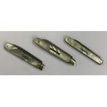 Three silver and MOP fruit knives with engraved de