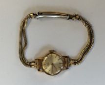 A lady's gold wristwatch on mesh strap. Approx. 14