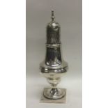 A Georgian silver sugar caster on square tapering