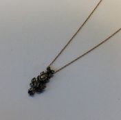 A Georgian gold mounted old cut diamond pendant on
