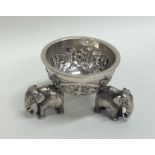 A heavy Indian silver salt decorated with elephant