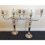 A good pair of silver plated candelabra with gadro