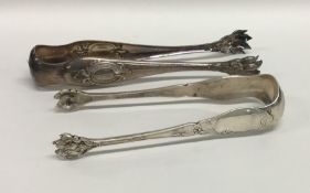 A pair of Continental silver ice tongs together wi