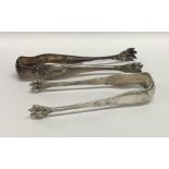 A pair of Continental silver ice tongs together wi