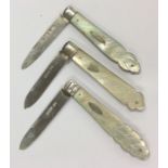 A group of three silver and MOP fruit knives with